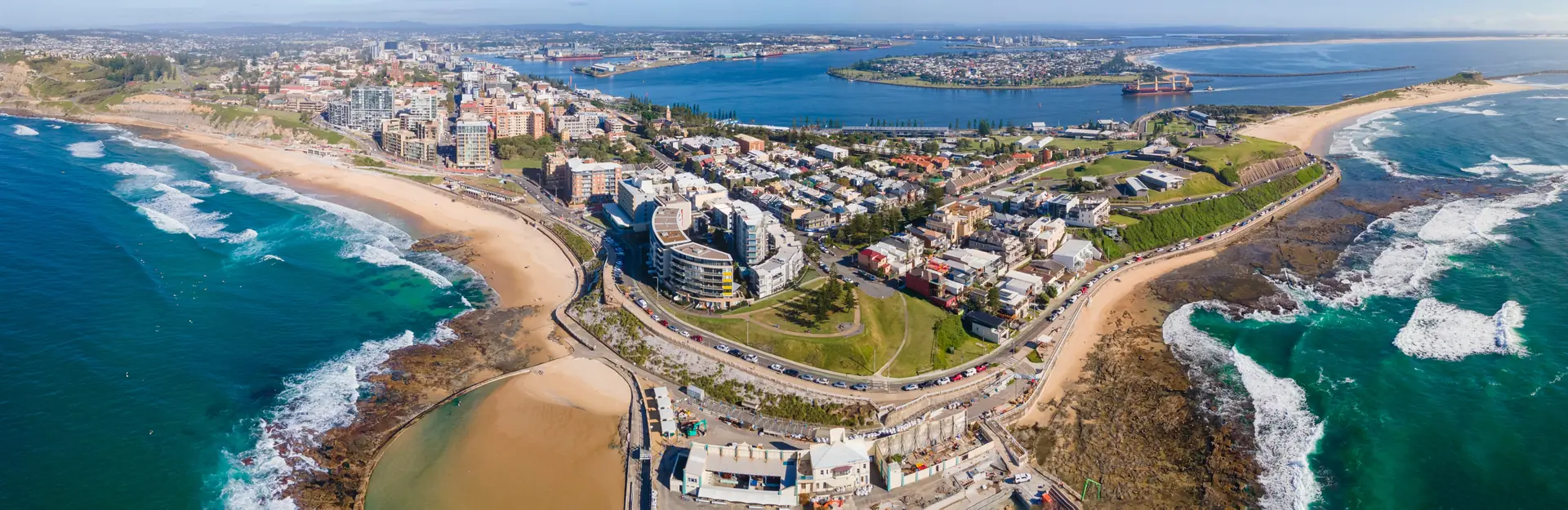 Panoramic aerial view of Newcastle Harbour and CBD , ten minutes from Alfred Lodge by car